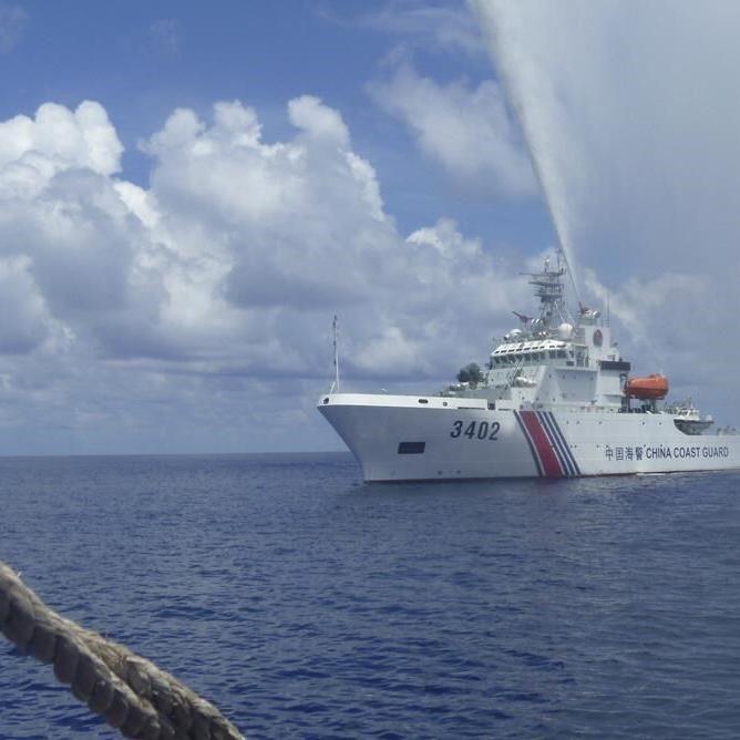 Chinese coast guard claims to have chased away Philippine navy ship from South China Sea shoal